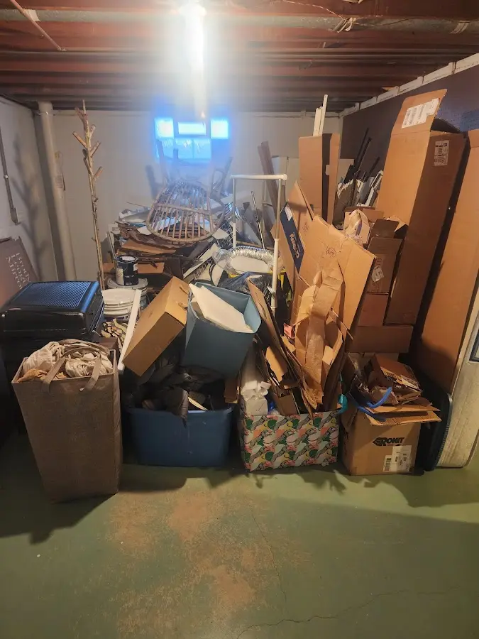 Roll-off dumpster container at job site for 4 Yard Dumpster Rental in Beaver Dam